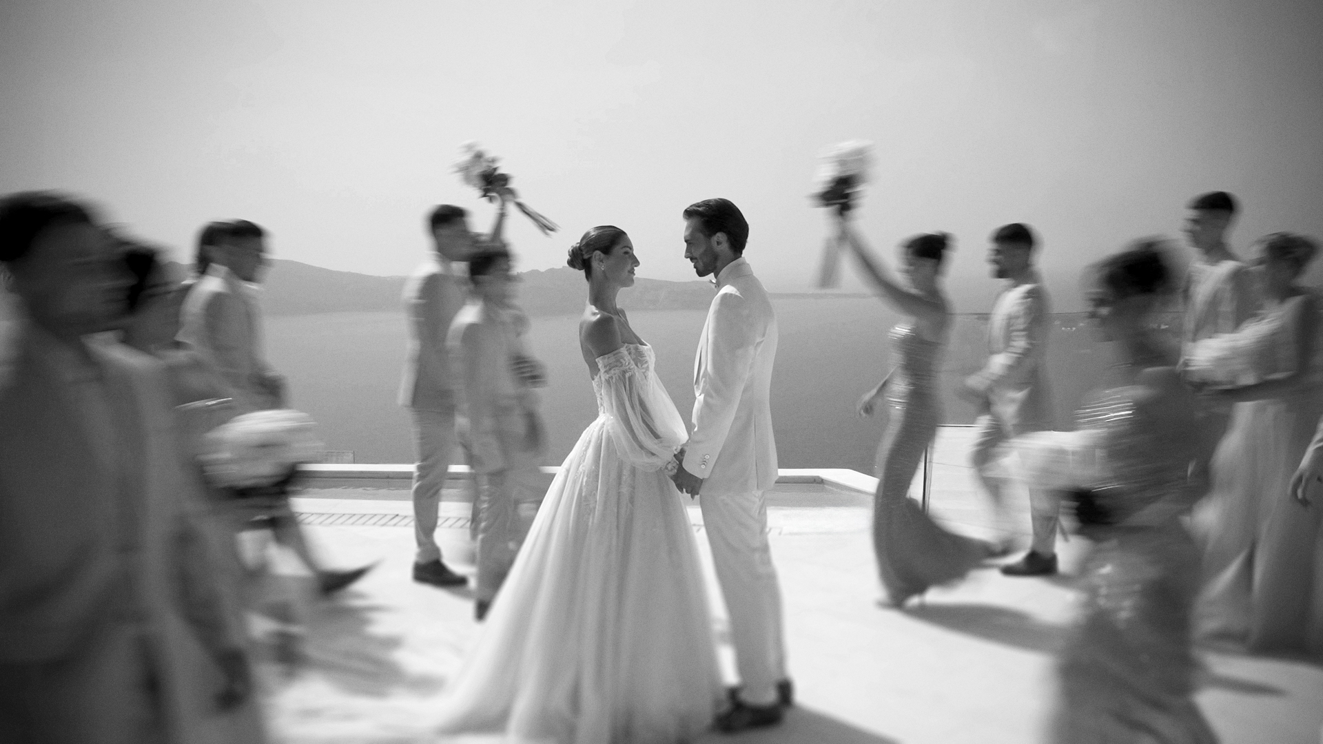Santorini destination wedding at Rocabella Hotel overlooking the Aegean Sea at Sunset