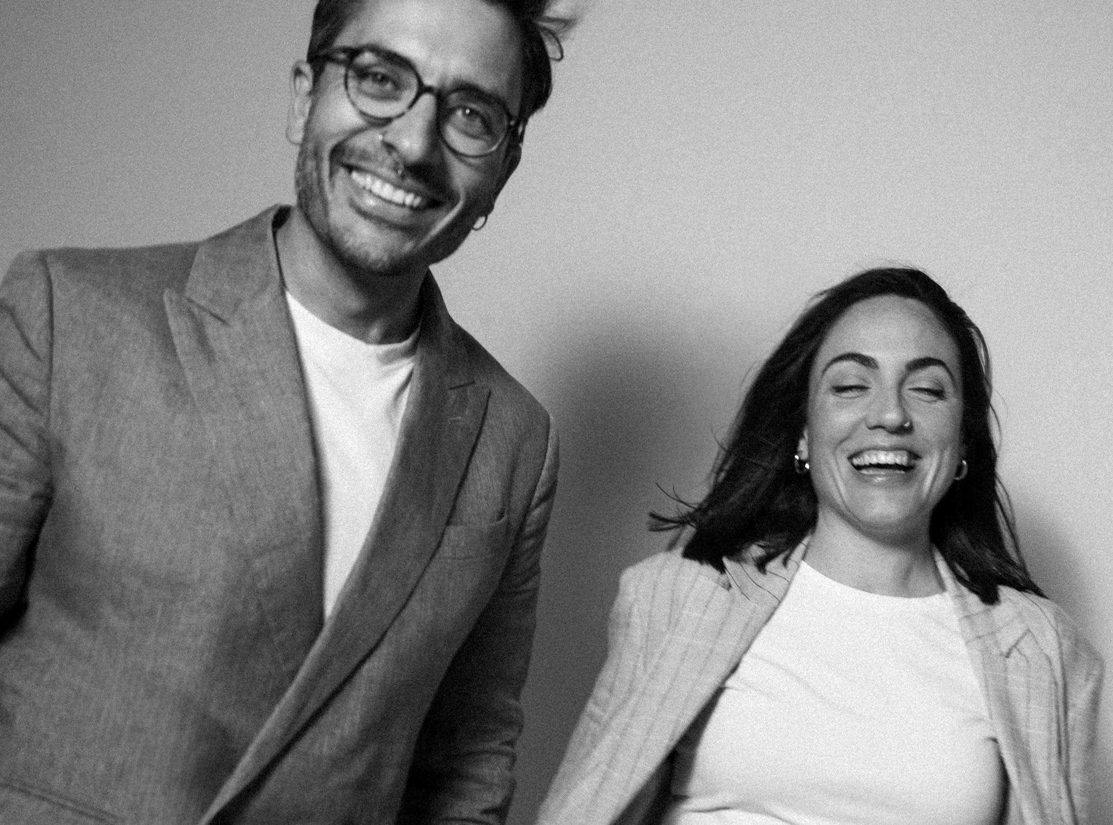 Bea and Edu, wedding videographers from Rice and Roses, smiling together